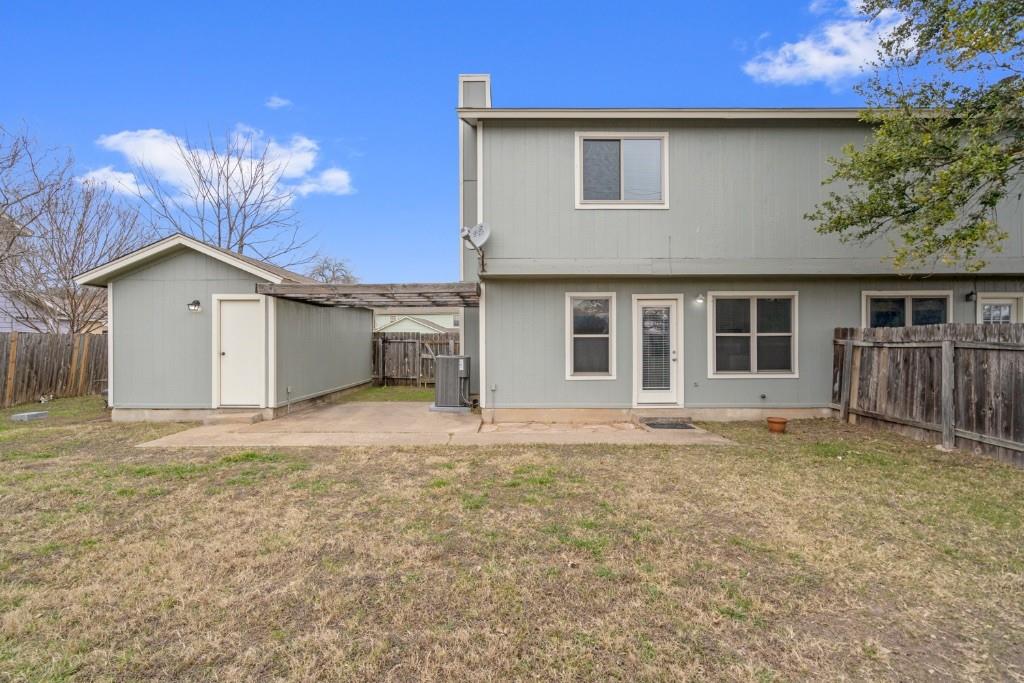 8807 Springmail Circle, Unit A Austin, TX 78729 - Photo 3 of 27 a house view with a garden space
