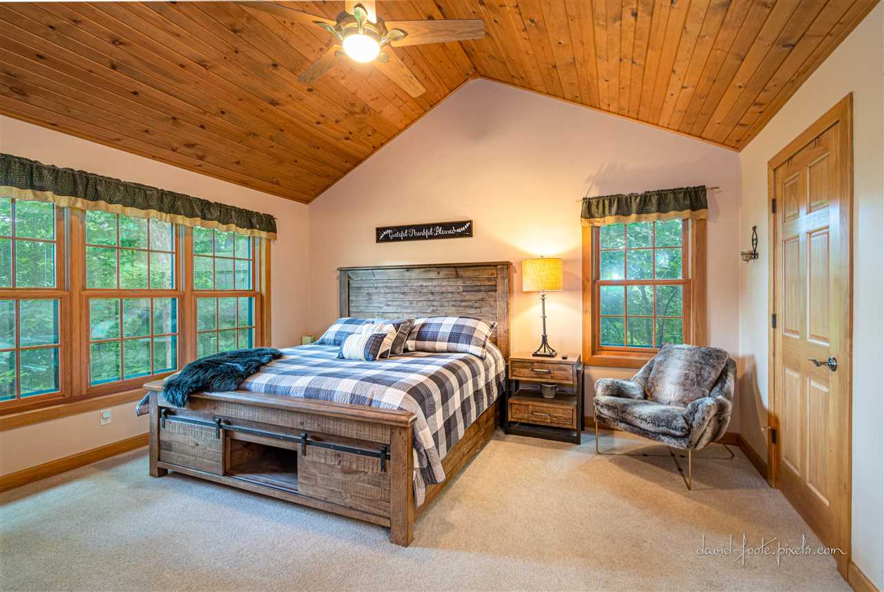8620 Fisher Road Hanover, IL 61041 - Photo 24 of 49 a bedroom with a bed and large windows