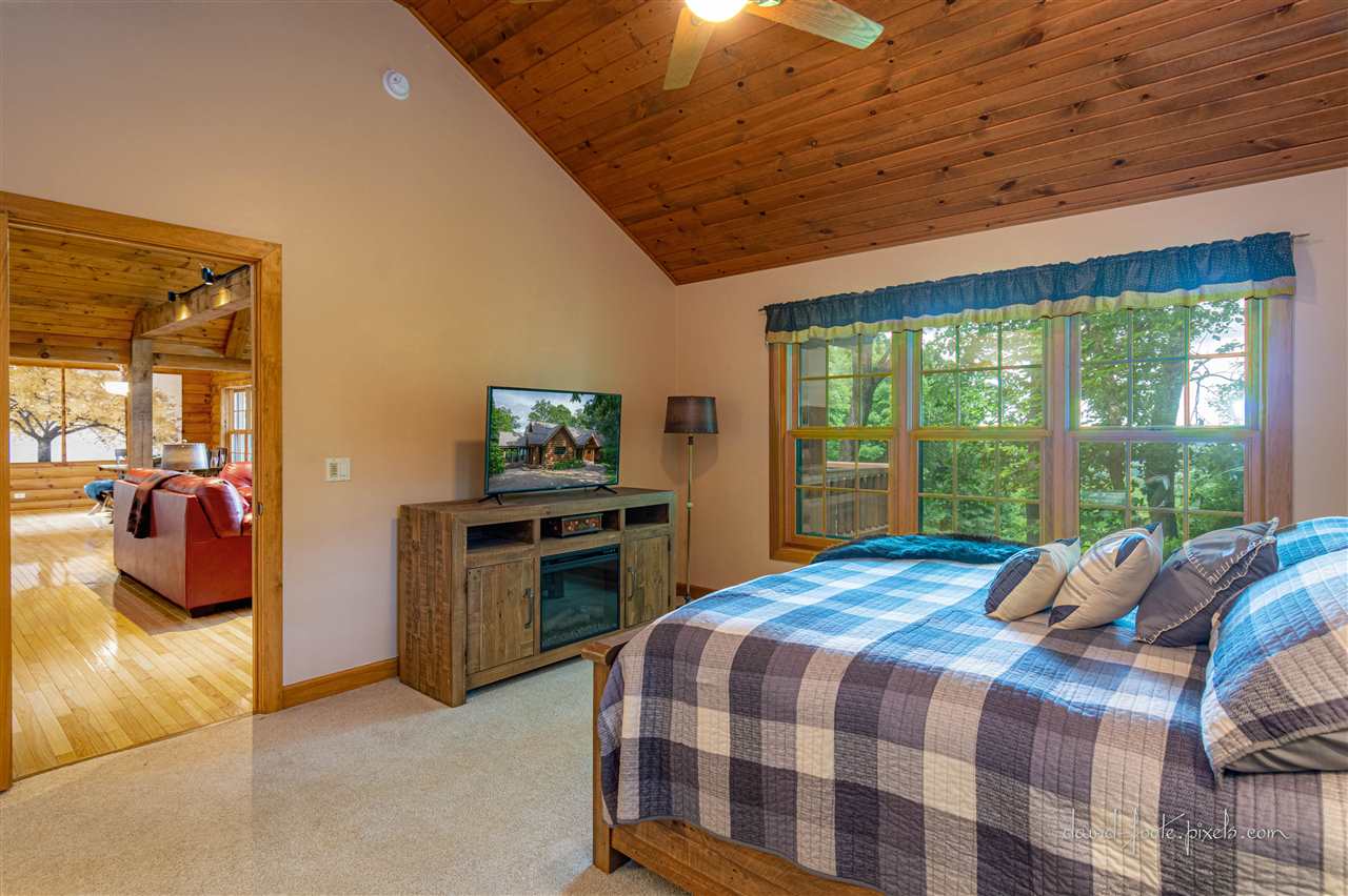 8620 Fisher Road Hanover, IL 61041 - Photo 25 of 49 a bedroom with a bed and balcony