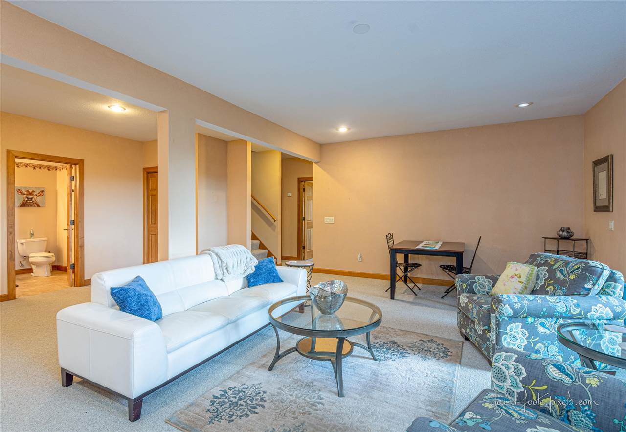 8620 Fisher Road Hanover, IL 61041 - Photo 29 of 49 a living room with furniture a rug and a table