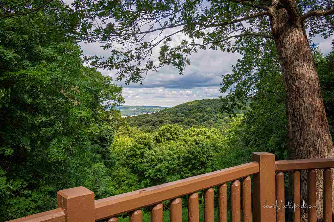 8620 Fisher Road Hanover, IL 61041 - Photo 35 of 49 a balcony with trees in front of it