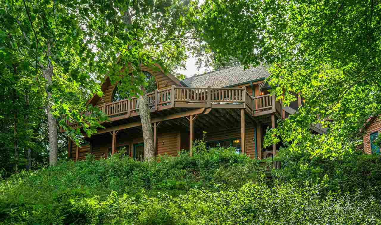 8620 Fisher Road Hanover, IL 61041 - Photo 5 of 49 front view of a house with a garden