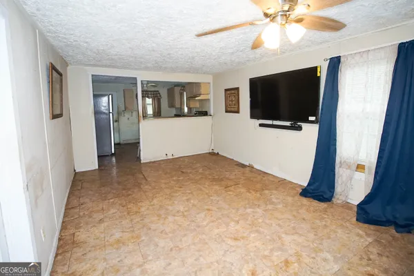 a view of a livingroom with a flat screen tv