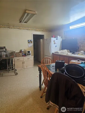 a room with furniture and a flat screen tv