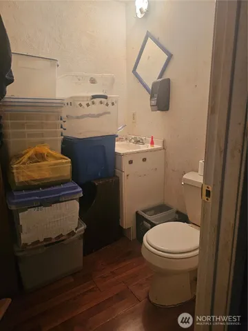 a bathroom with a toilet and a sink