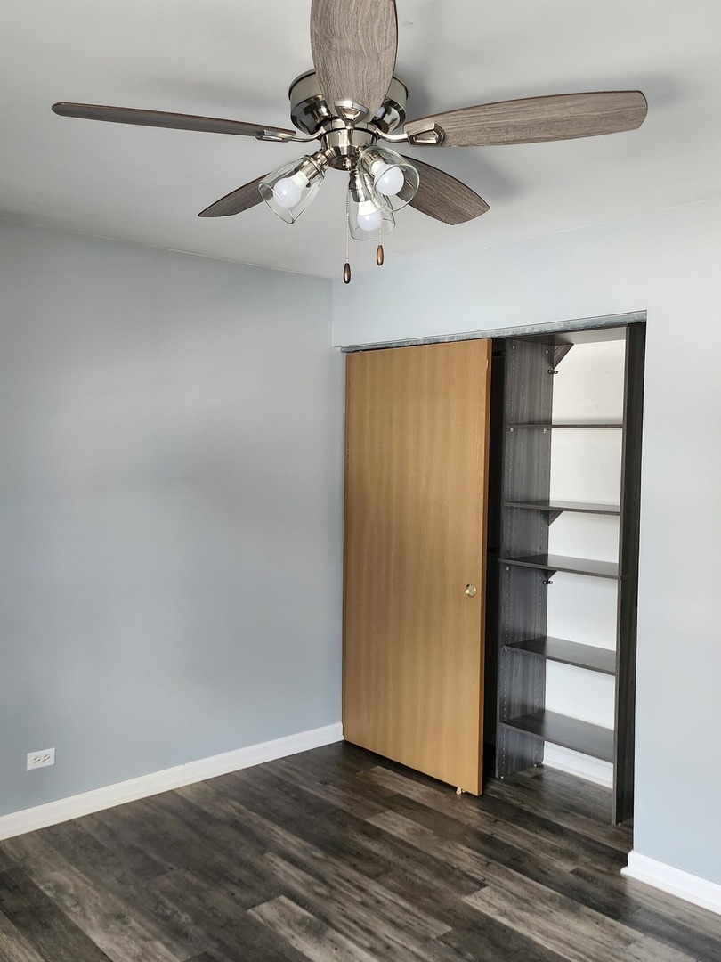 316 East Victoria Circle, Unit 316 North Aurora, IL 60542 - Photo 37 of 54 a view of empty room with wooden floor