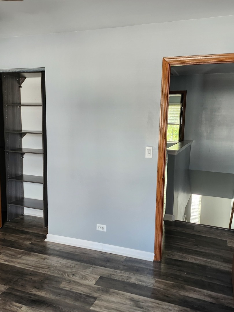 316 East Victoria Circle, Unit 316 North Aurora, IL 60542 - Photo 38 of 54 a view of entryway and hall with wooden floor