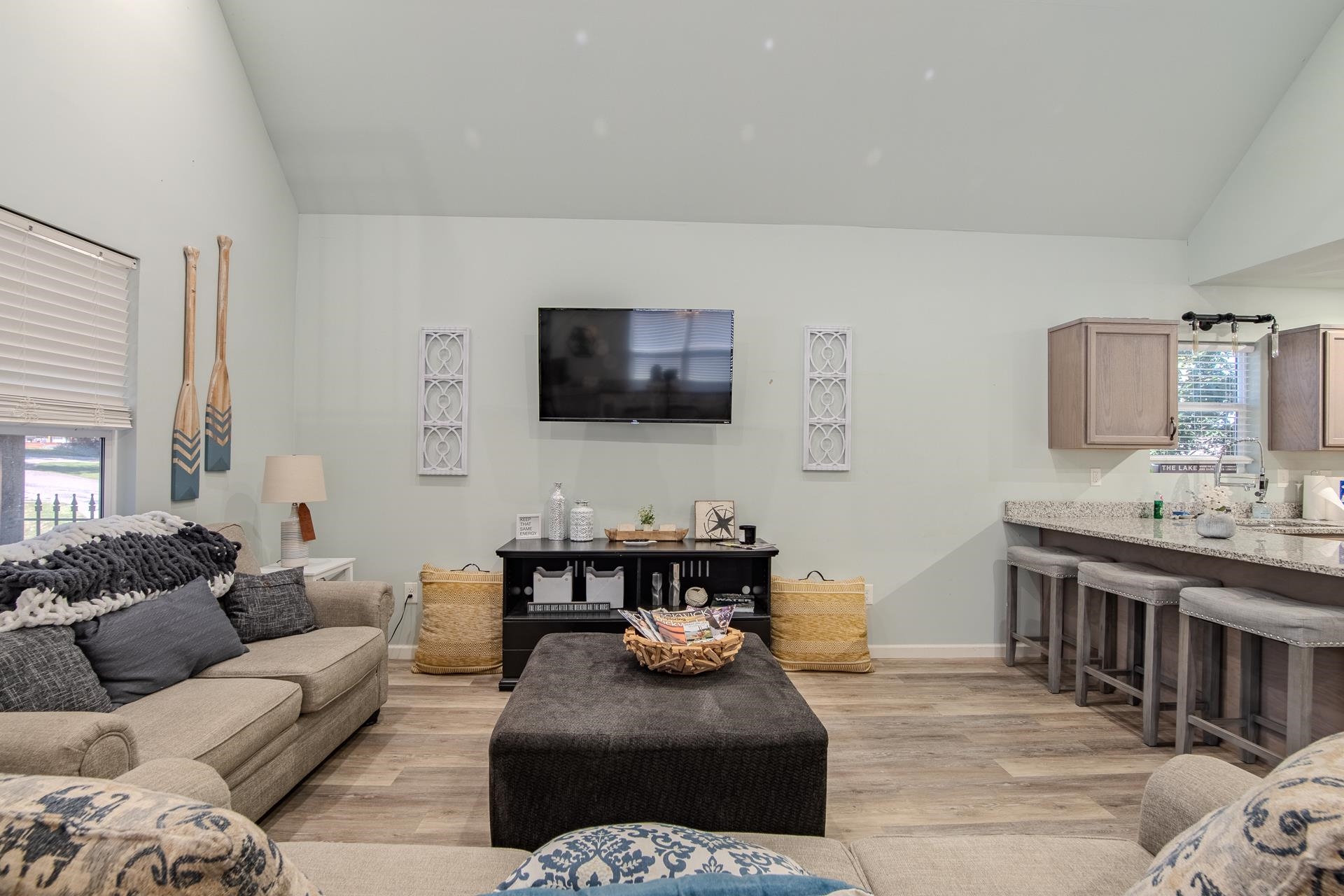 25 Bogey Loop Counce, TN 38326 - Photo 10 of 37 Living area featuring vaulted ceiling and light wood-style floors