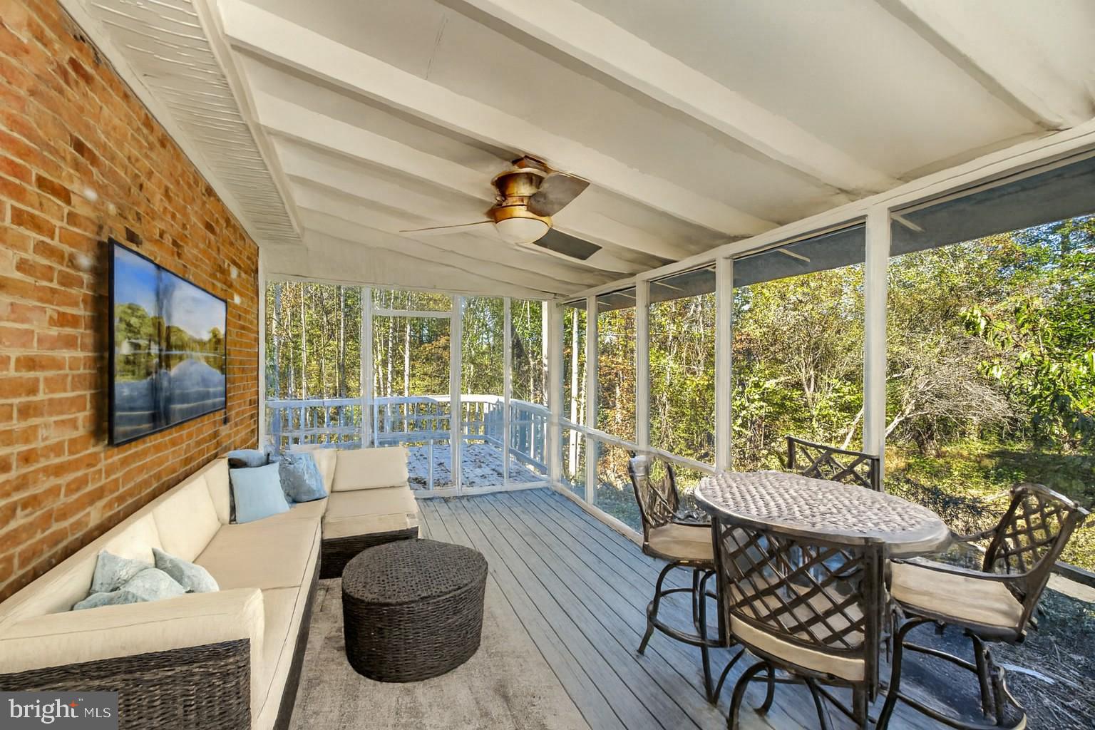 6709 Marye Road Spotsylvania, VA 22551 - Photo 12 of 73 a living room with furniture and a flat screen tv