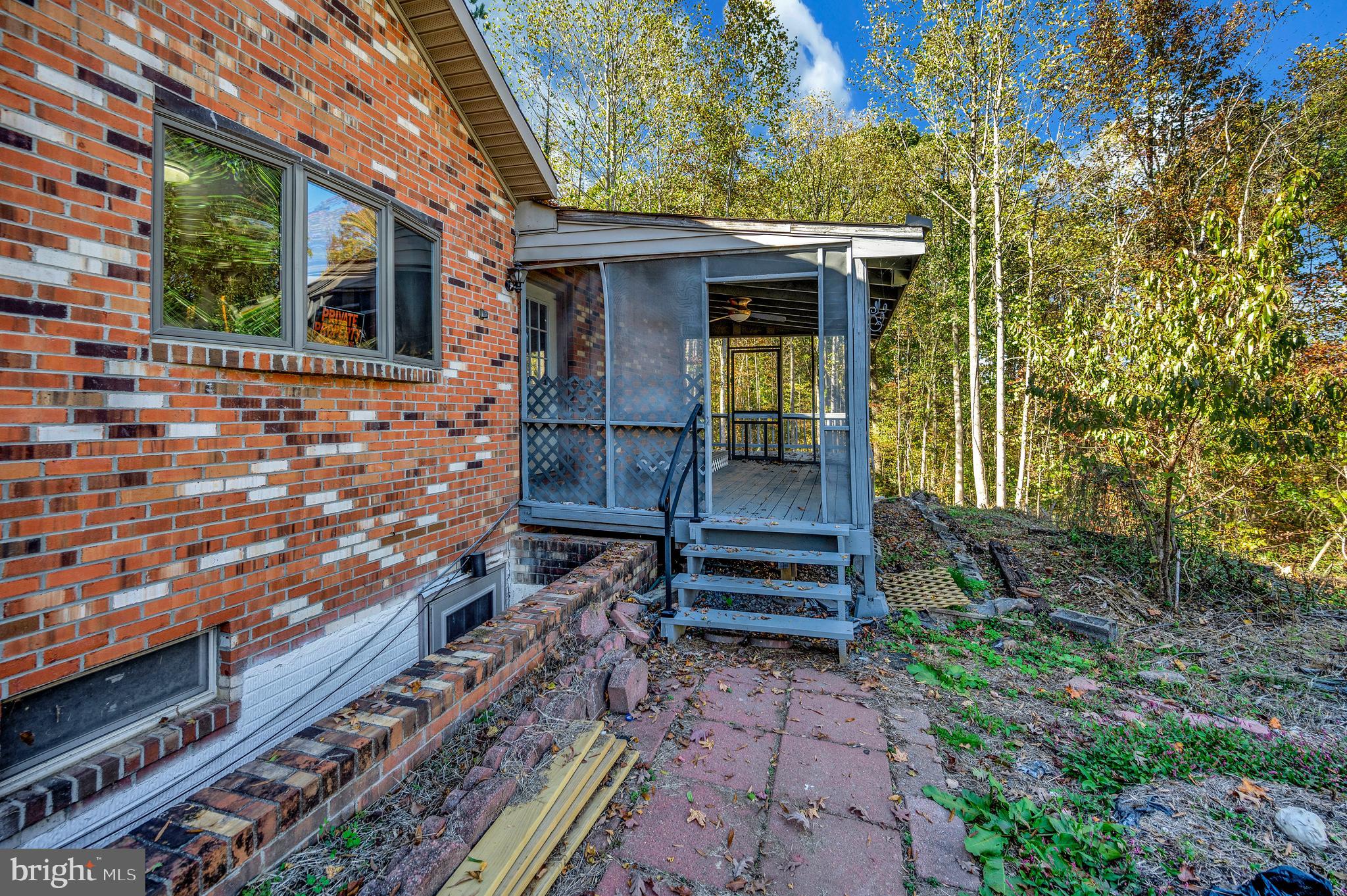 6709 Marye Road Spotsylvania, VA 22551 - Photo 13 of 73 a front view of a house with garden