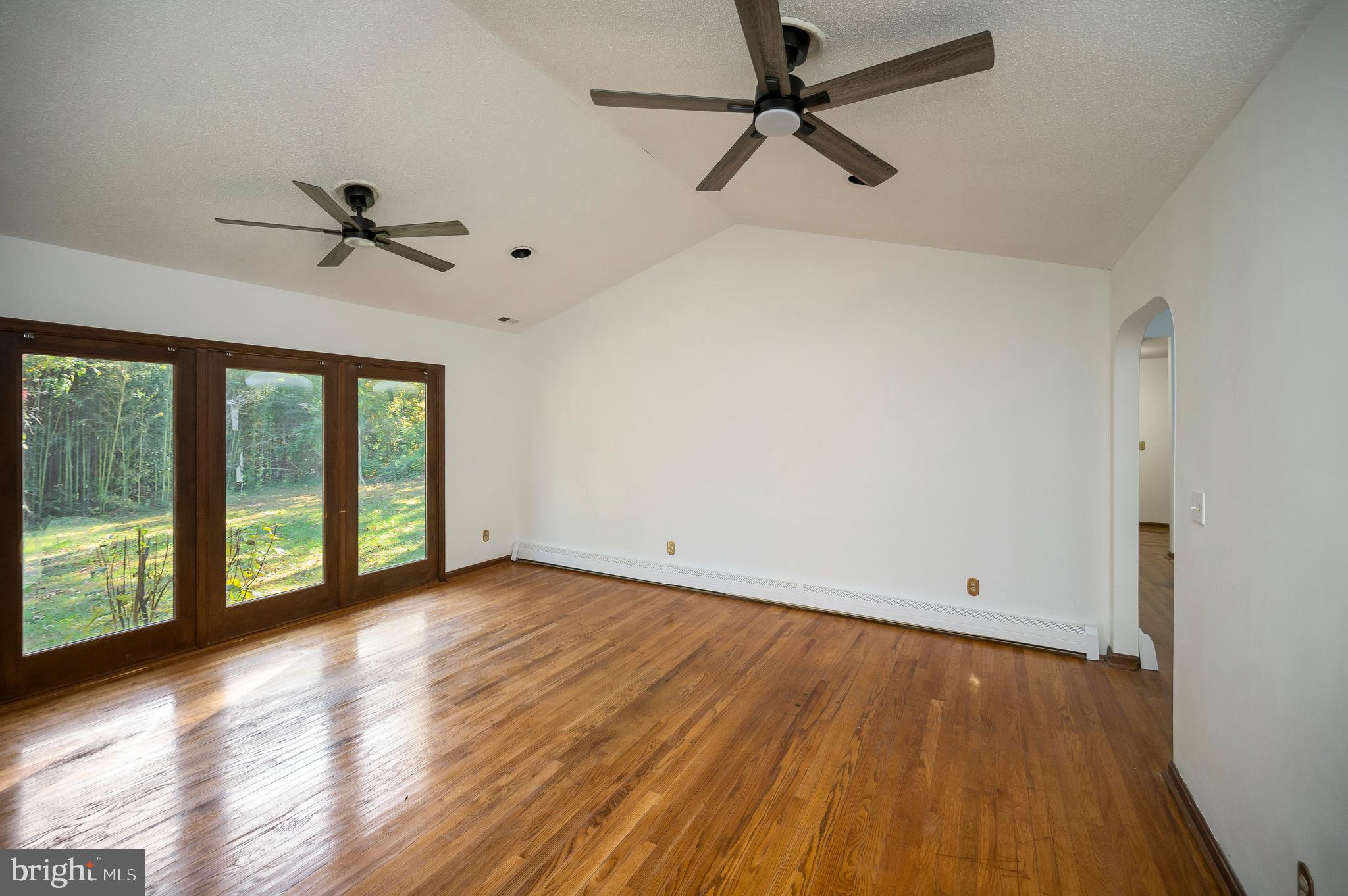 6709 Marye Road Spotsylvania, VA 22551 - Photo 16 of 73 wooden floor in an empty room with a window
