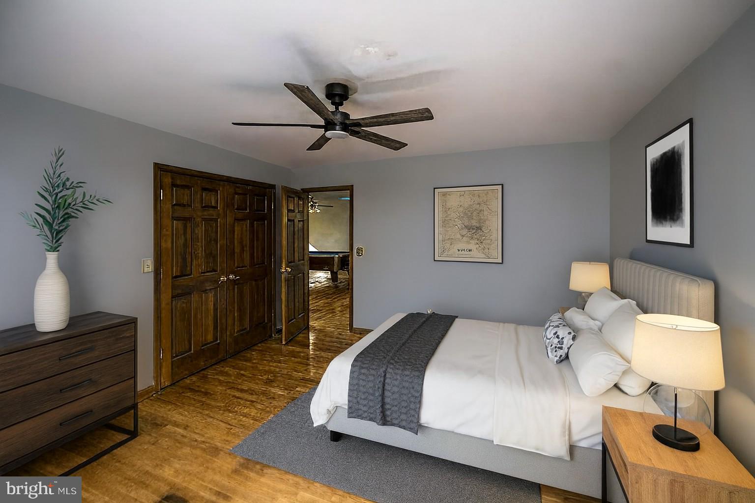 6709 Marye Road Spotsylvania, VA 22551 - Photo 27 of 73 a bedroom with a bed and a potted plant on the dresser