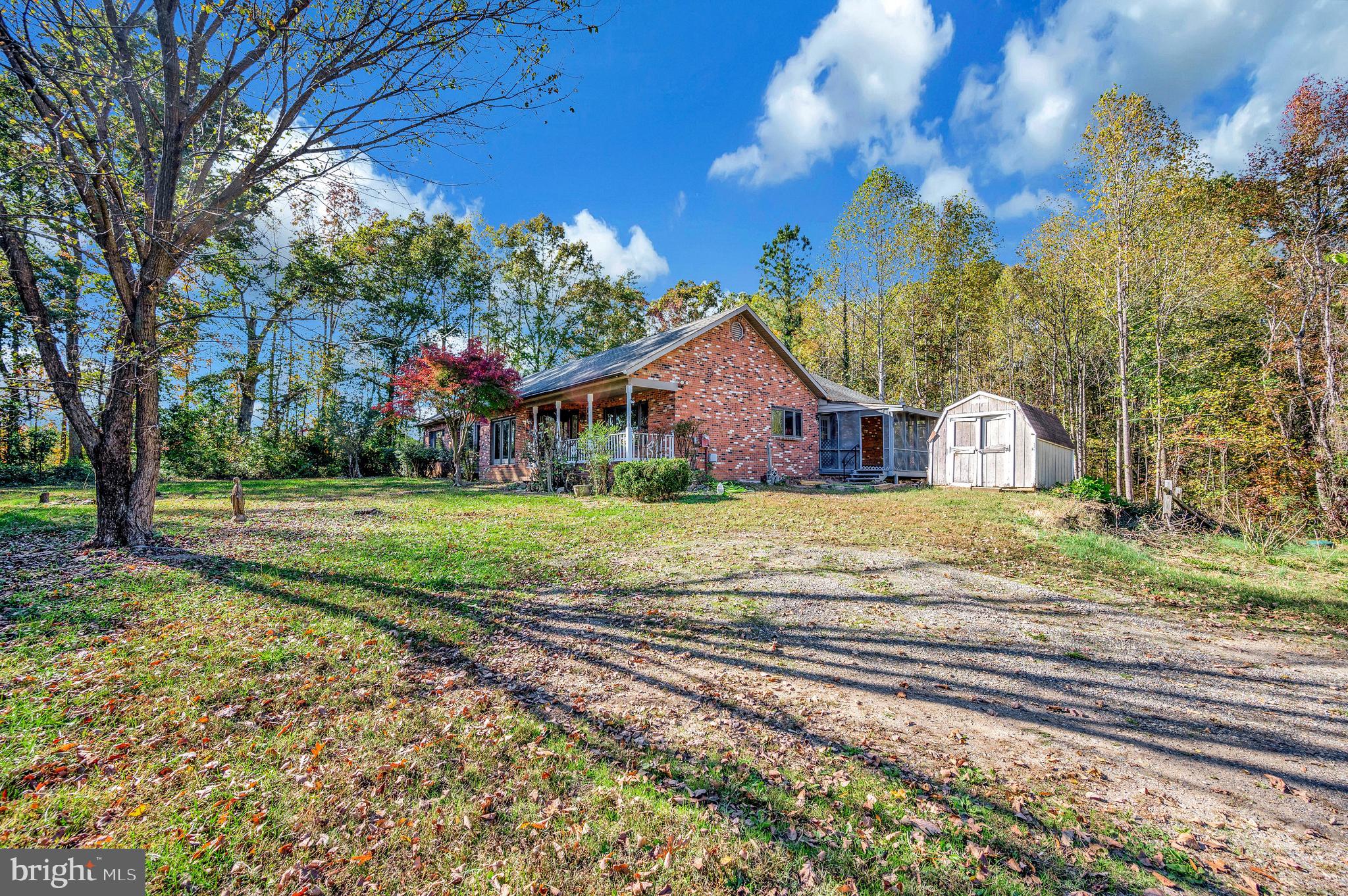 6709 Marye Road Spotsylvania, VA 22551 - Photo 3 of 73 a front view of a house with garden