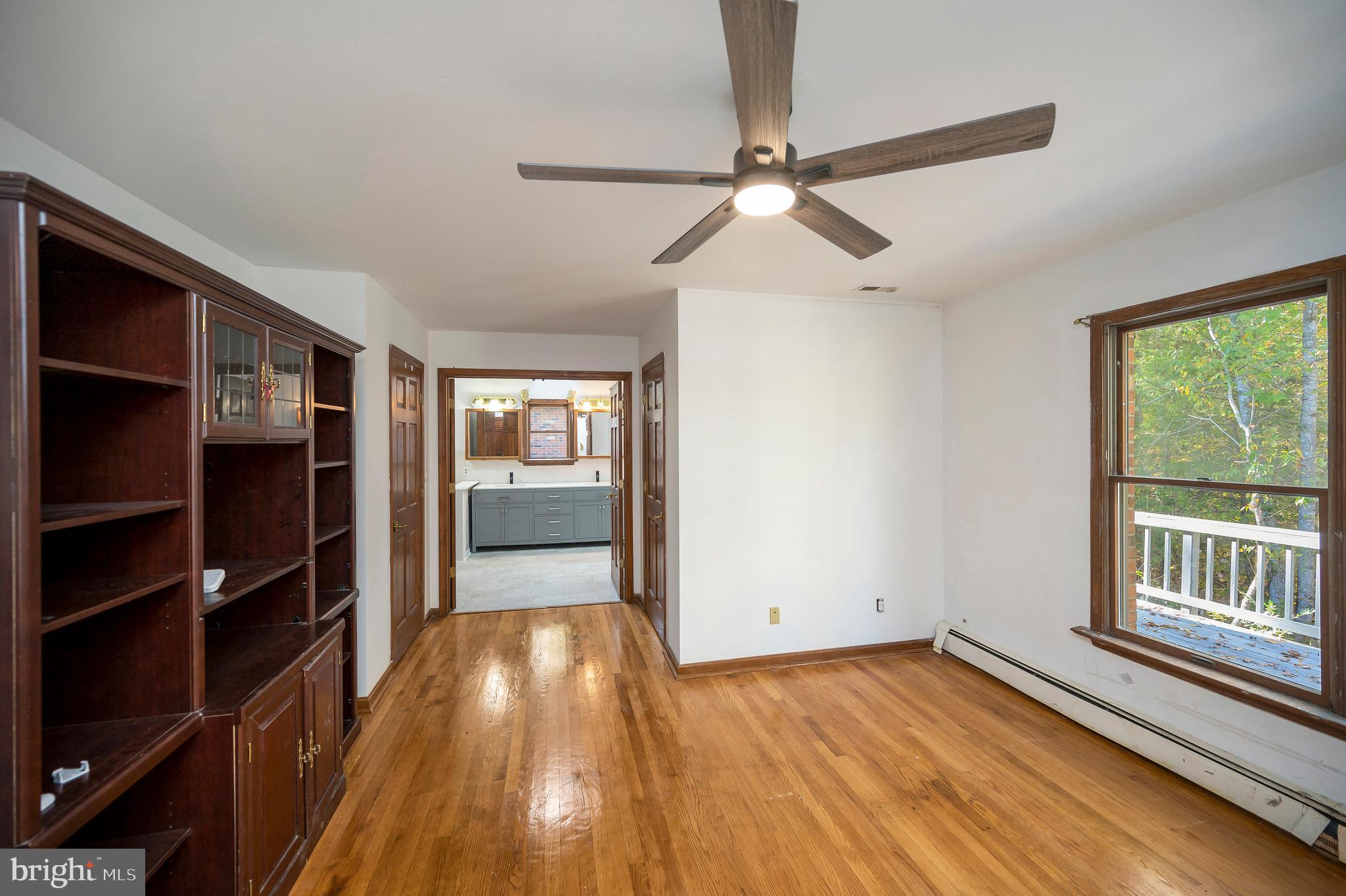 6709 Marye Road Spotsylvania, VA 22551 - Photo 53 of 73 wooden floor in an empty room with a window
