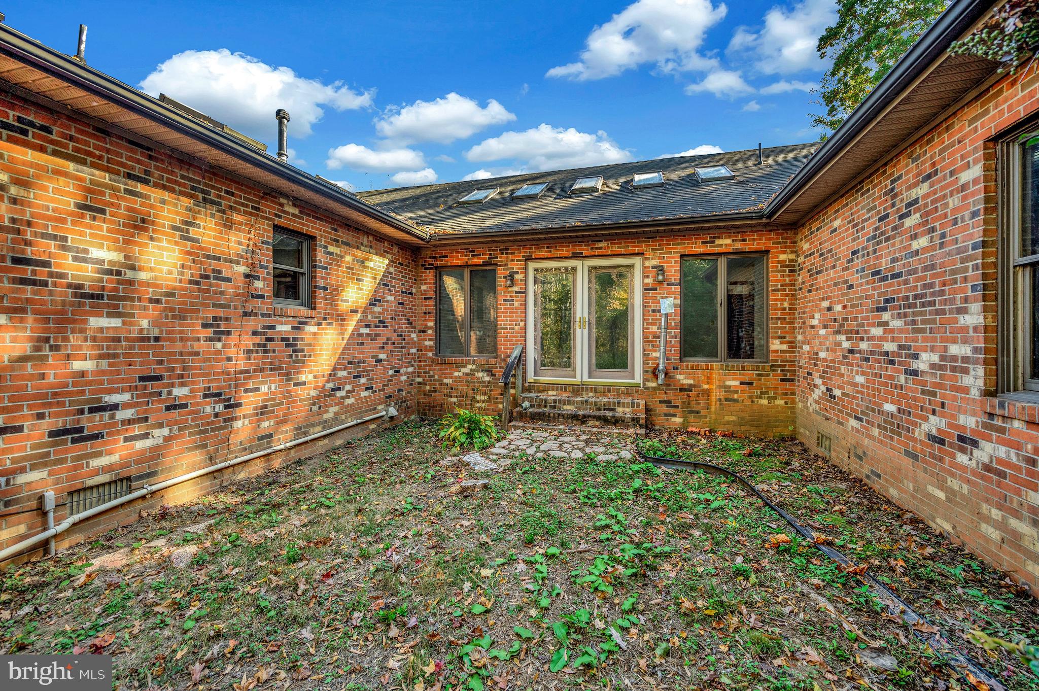 6709 Marye Road Spotsylvania, VA 22551 - Photo 6 of 73 a view of house with backyard