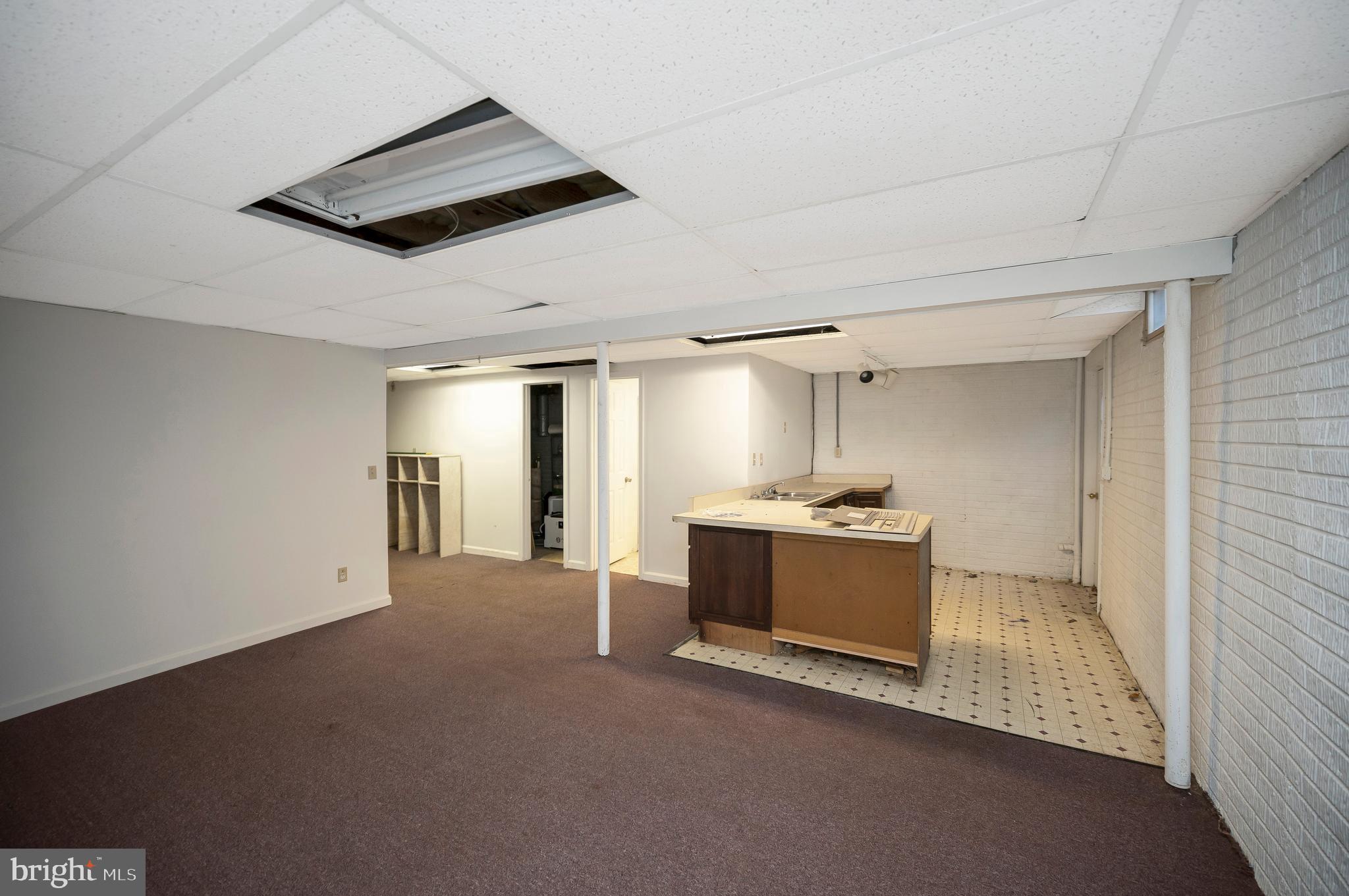 6709 Marye Road Spotsylvania, VA 22551 - Photo 64 of 73 a view of a kitchen with a sink and a stove top oven