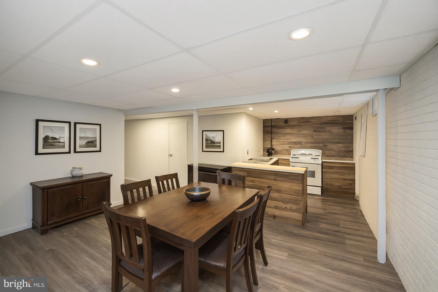 6709 Marye Road Spotsylvania, VA 22551 - Photo 65 of 73 a view of a dining room with furniture and wooden floor