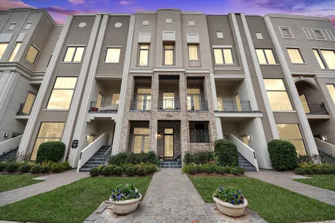 a front view of a multi story residential apartment building