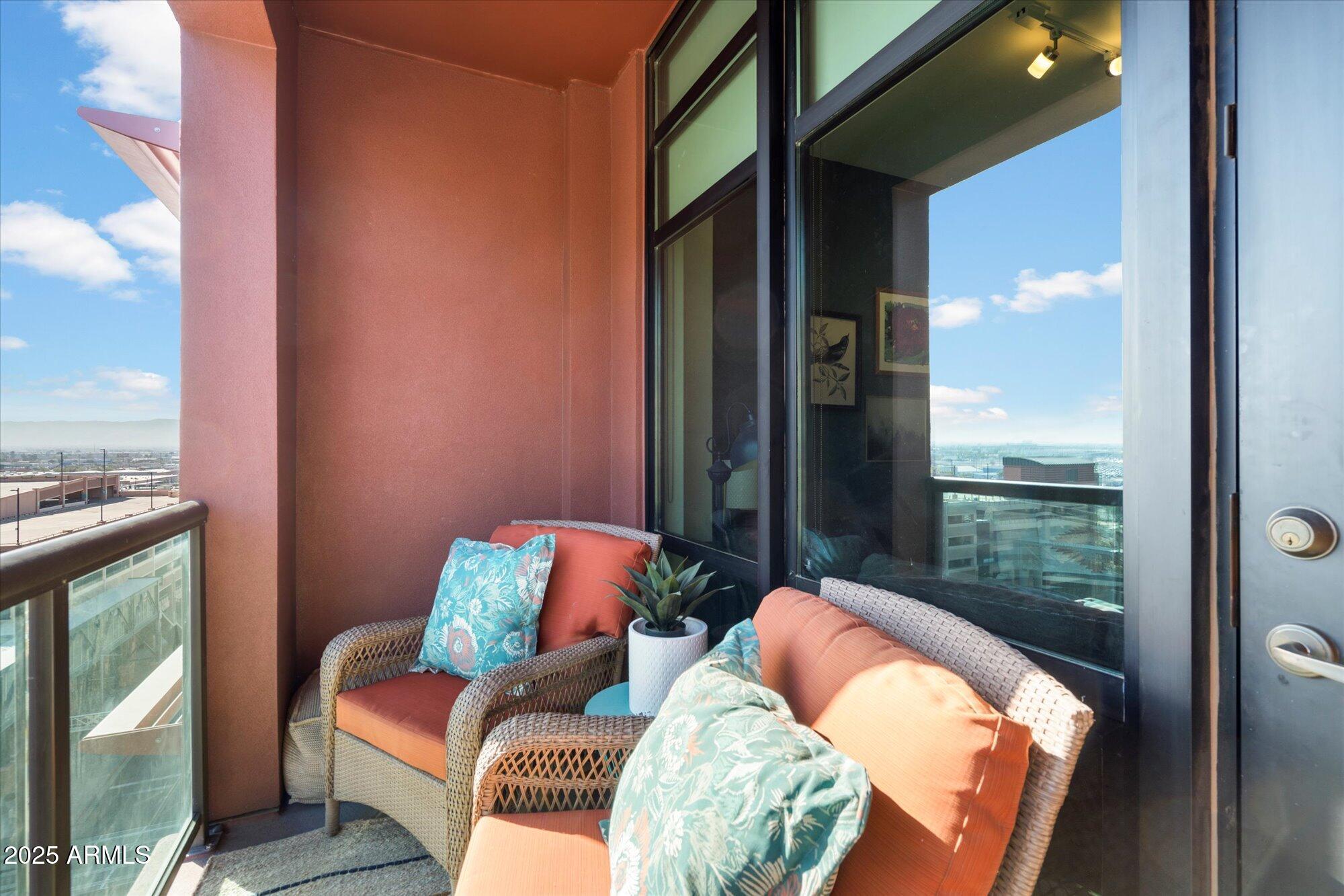 310 South 4th Street, Unit 908 Phoenix, AZ 85004 - Photo 14 of 44 a outdoor living room with furniture