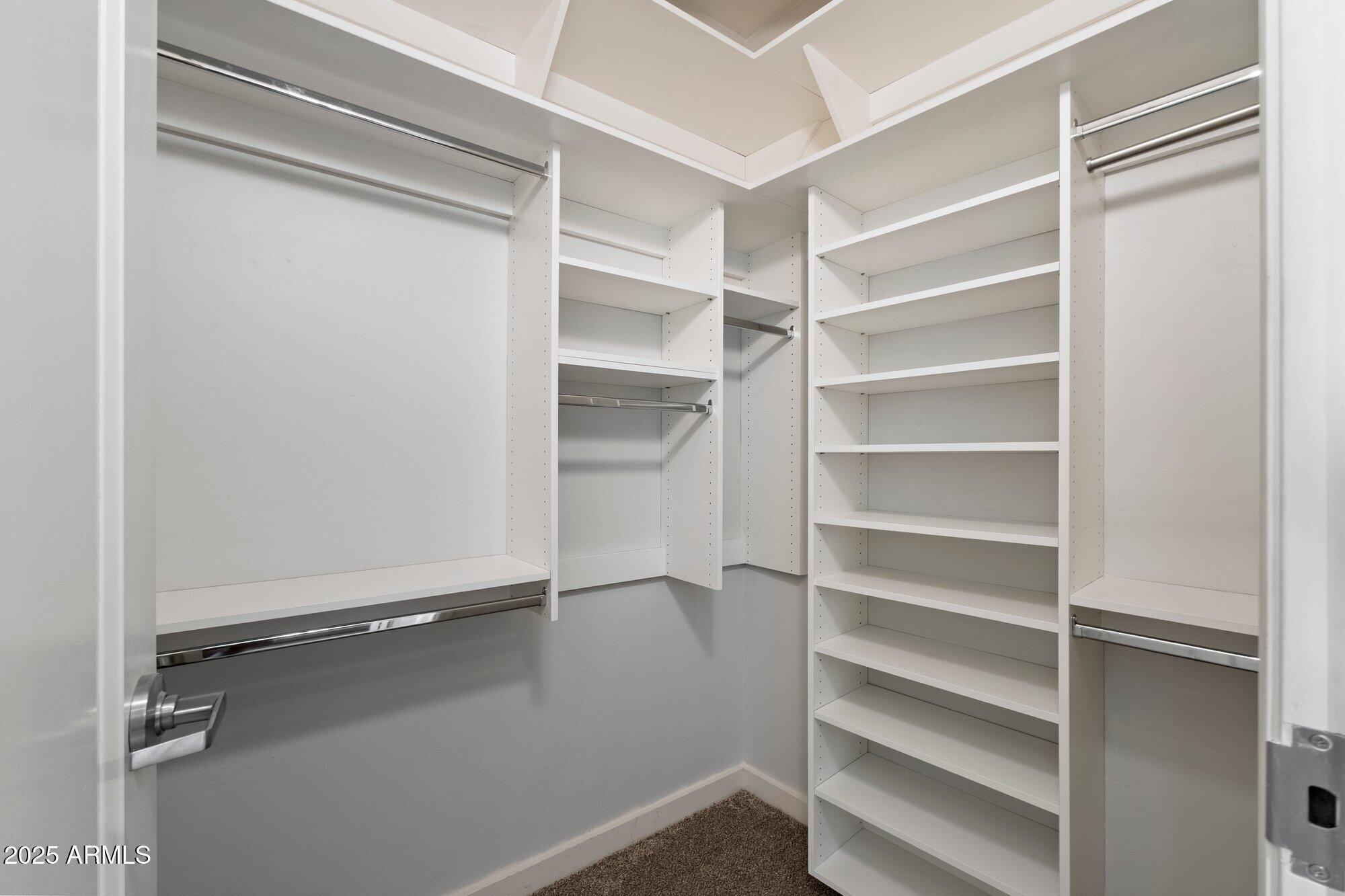 310 South 4th Street, Unit 908 Phoenix, AZ 85004 - Photo 21 of 44 a view of an empty walk in closet