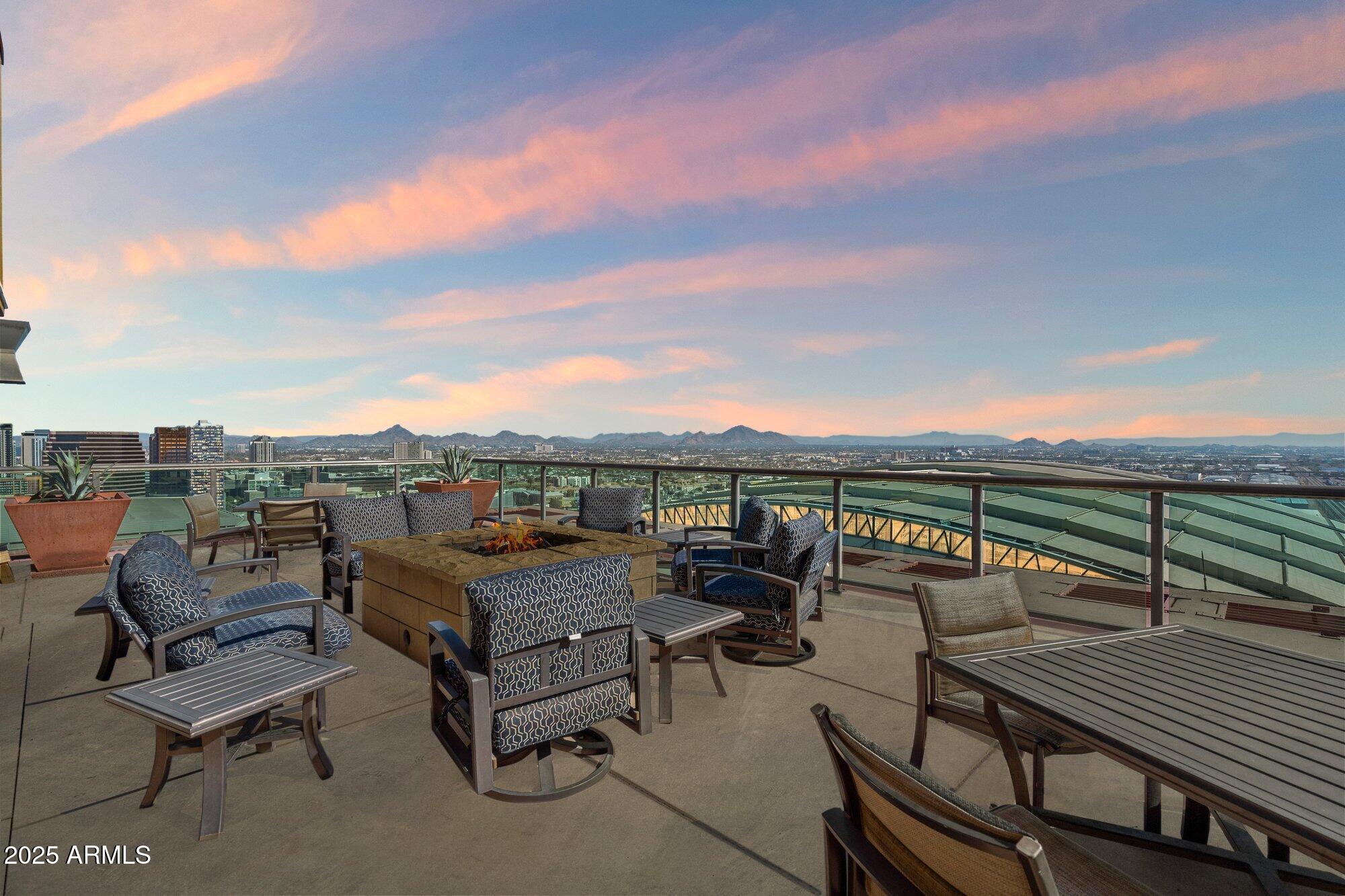 310 South 4th Street, Unit 908 Phoenix, AZ 85004 - Photo 35 of 44 a view of a terrace with outdoor seating