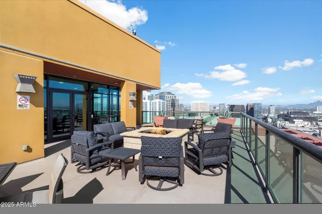 a view of a terrace with outdoor seating