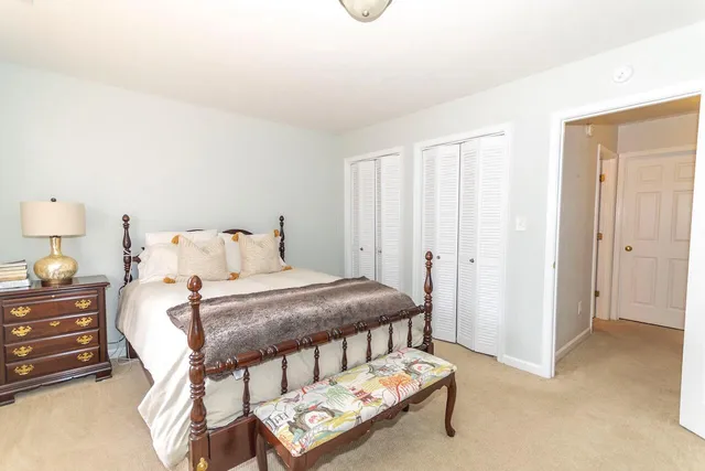 a bathroom with a sink a toilet and shower curtain