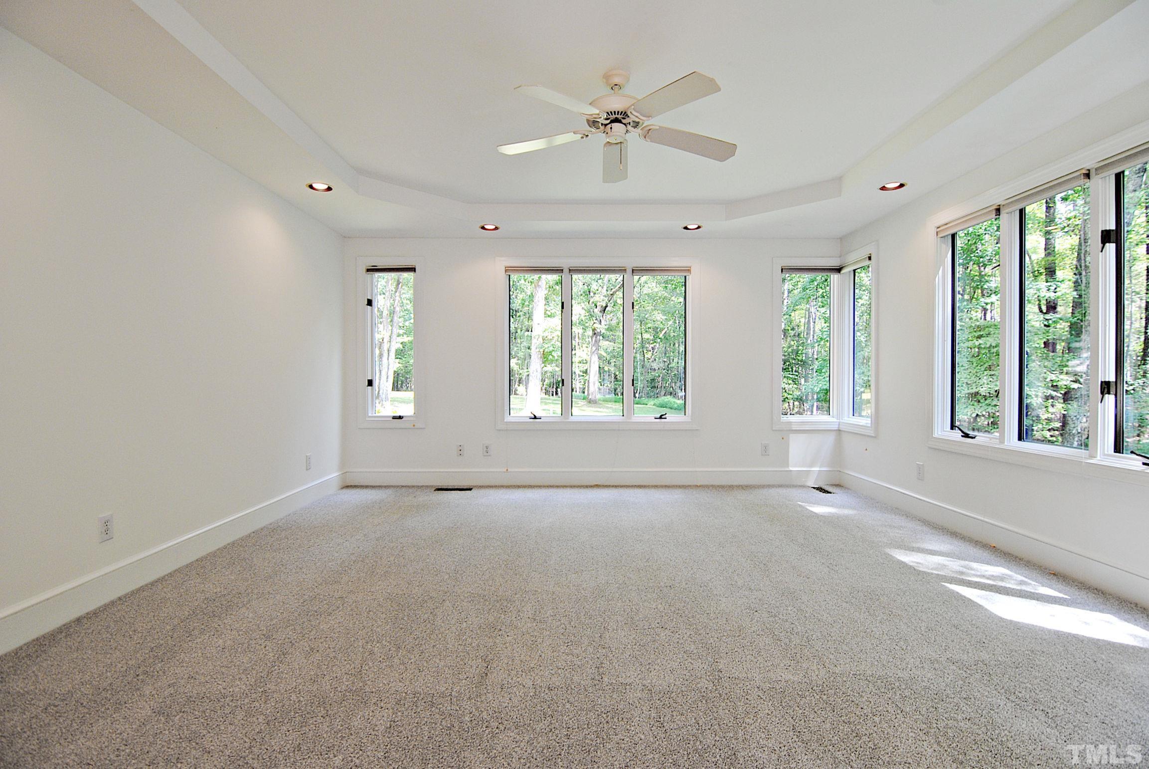 7106 Matthews Road Durham, NC 27712 - Photo 13 of 30 a view of an empty room with a window