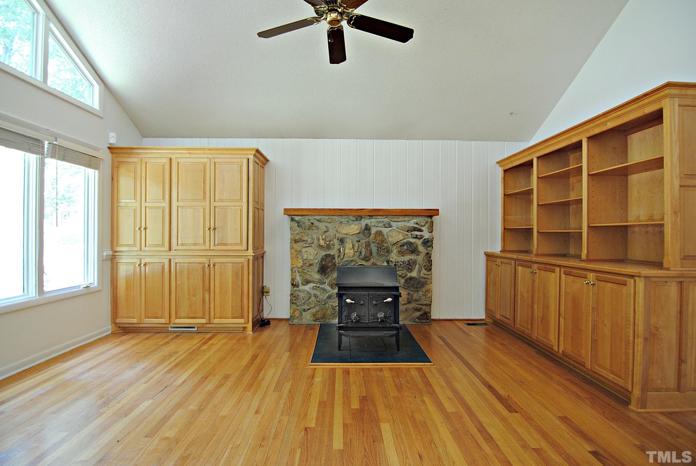 7106 Matthews Road Durham, NC 27712 - Photo 7 of 30 wooden floor in an empty room with a window