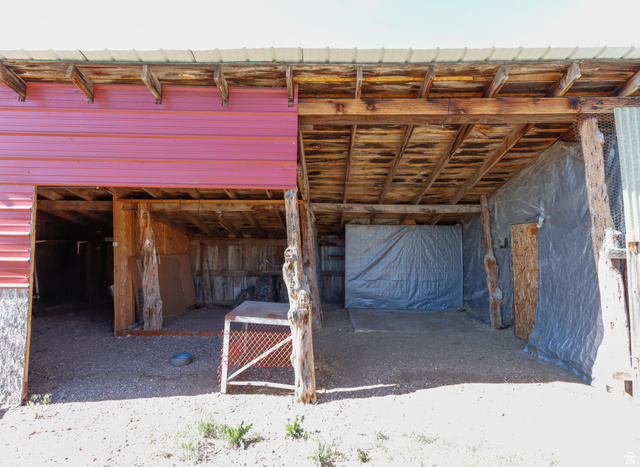 155 West Center Street Fillmore, UT 84631 - Photo 80 of 86 Open-air utility structure featuring a metal roof and exposed wood beam supports