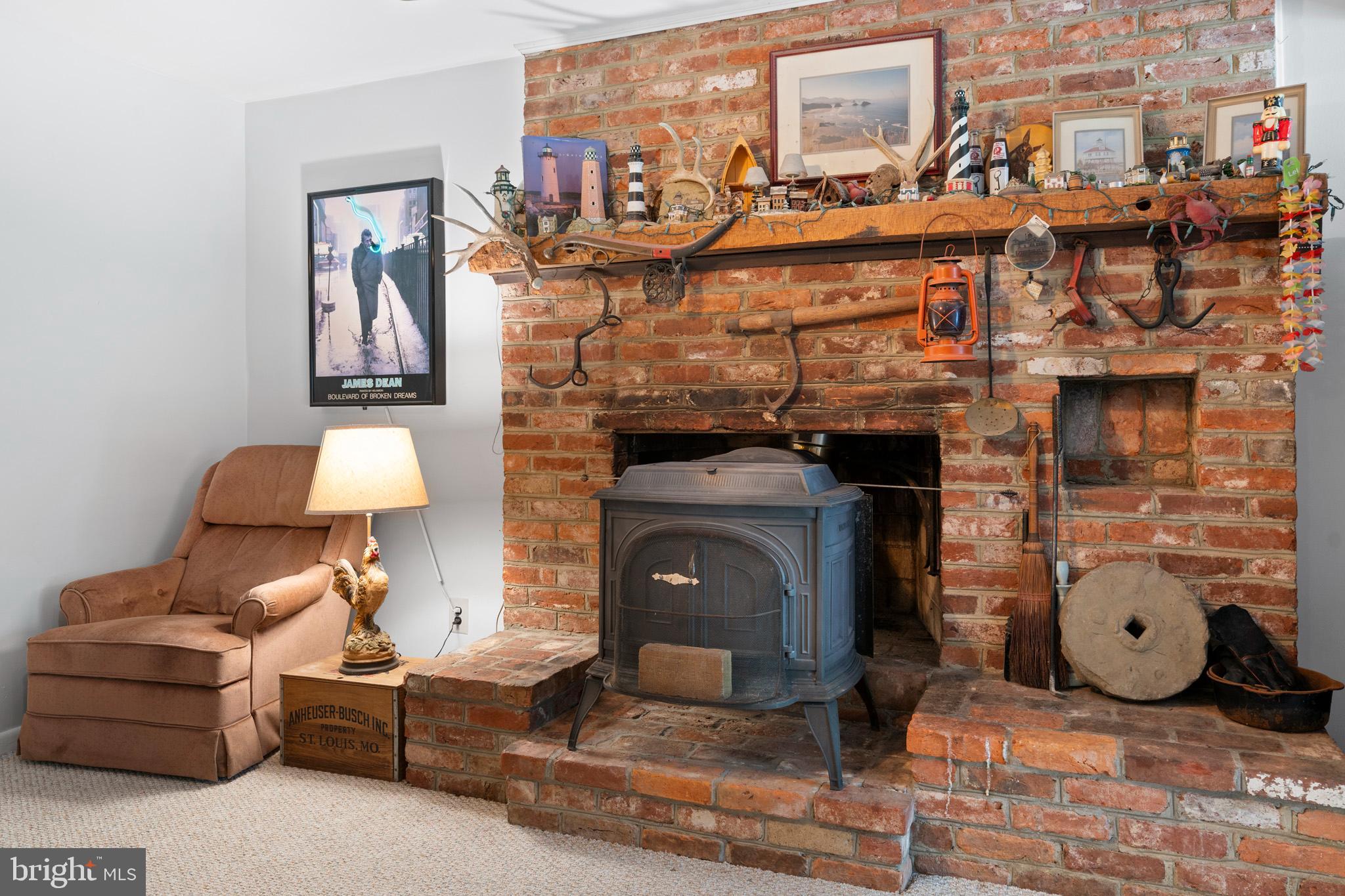 3521 Accokeek Road Waldorf, MD 20601 - Photo 31 of 70 Wood stove w/ brick surround fireplace