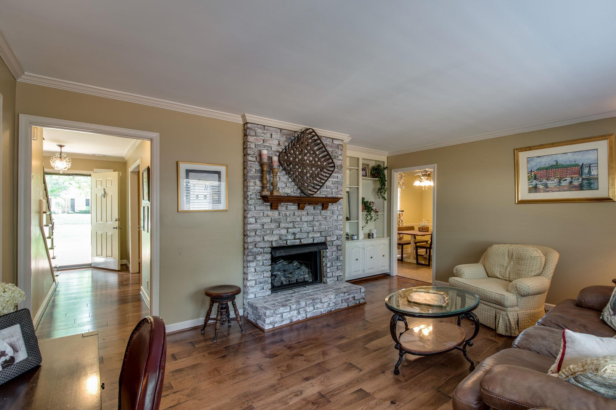 1501 Blue Springs Road Franklin, TN 37069 - Photo 14 of 30 a living room with furniture and a fireplace