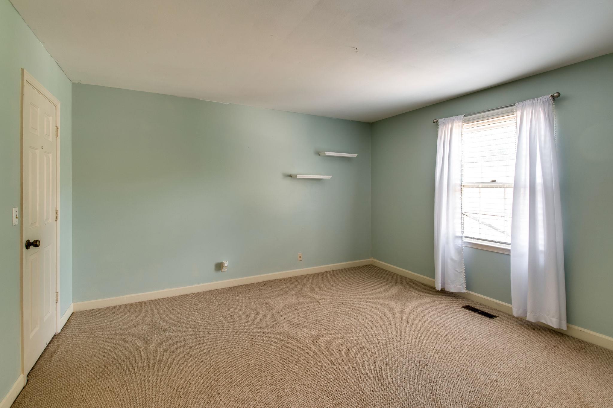 1501 Blue Springs Road Franklin, TN 37069 - Photo 17 of 30 an empty room with closet and windows