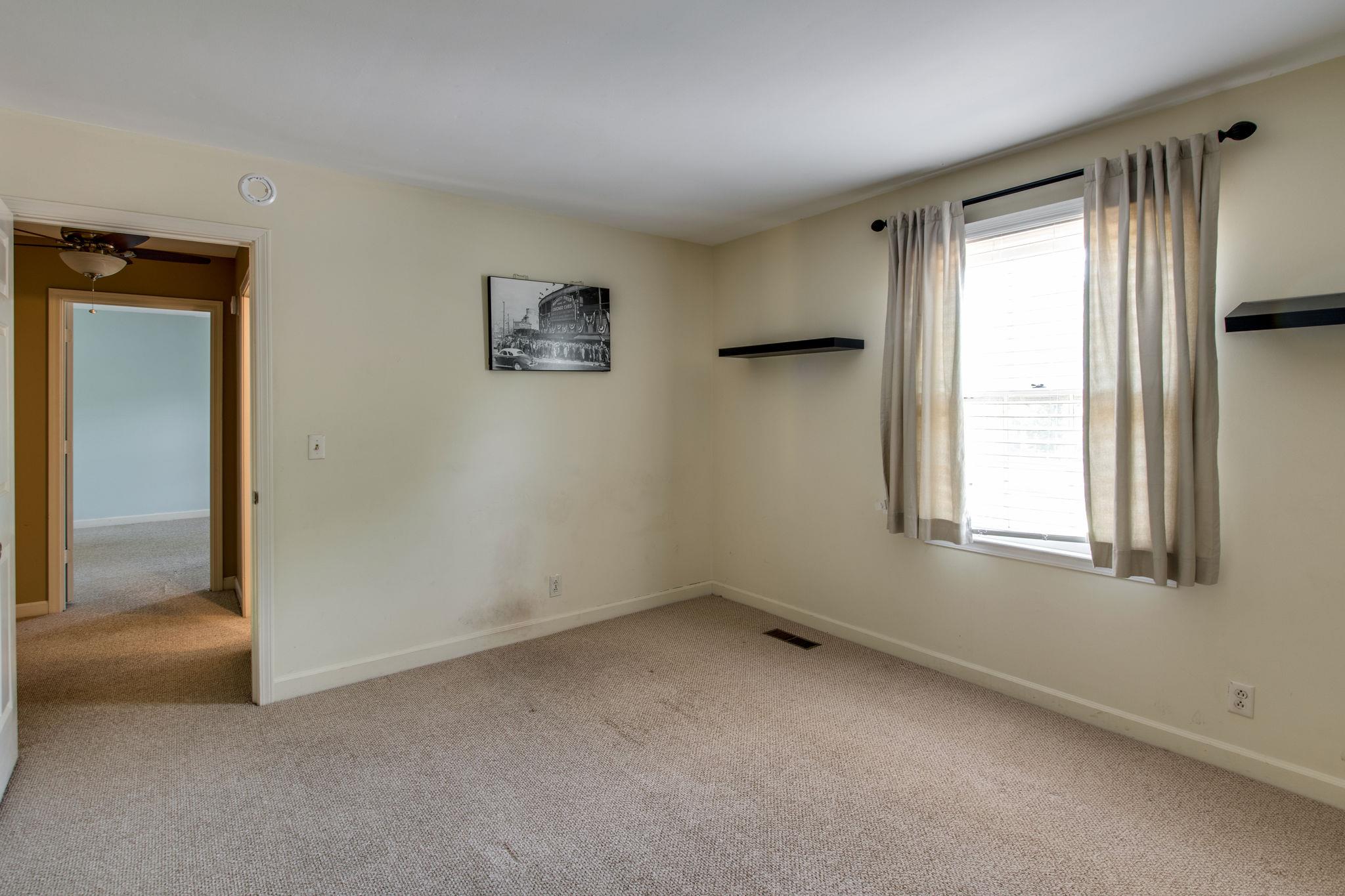 1501 Blue Springs Road Franklin, TN 37069 - Photo 18 of 30 an empty room with windows and closet
