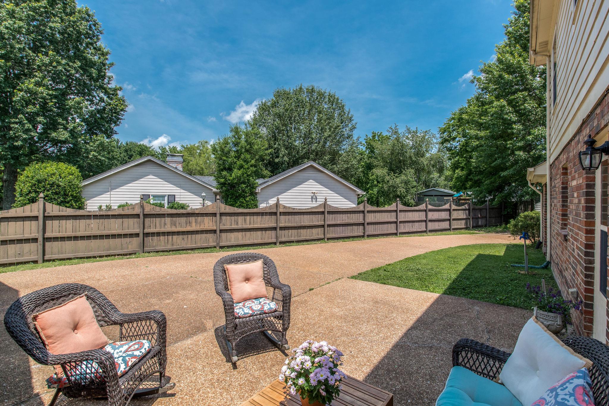 1501 Blue Springs Road Franklin, TN 37069 - Photo 25 of 30 a view of a chairs and table in the patio