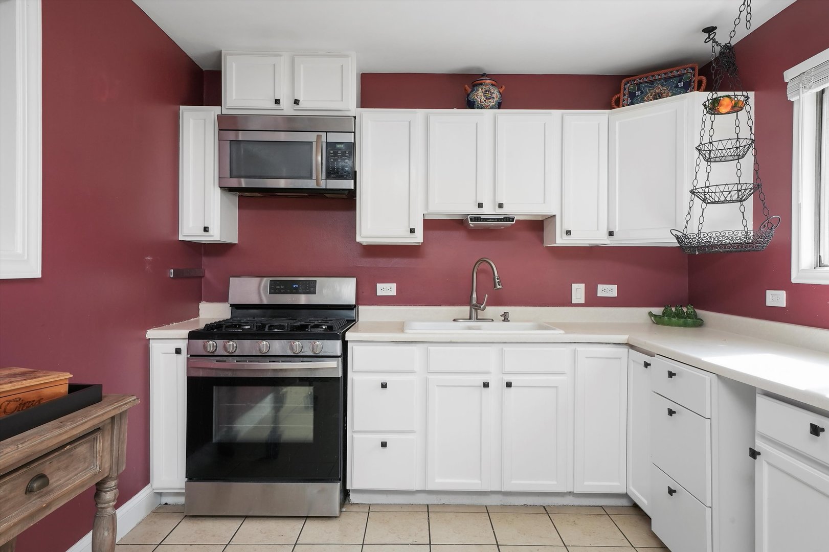 176 Oxford Road Bolingbrook, IL 60440 - Photo 11 of 43 a kitchen with cabinets appliances and a sink