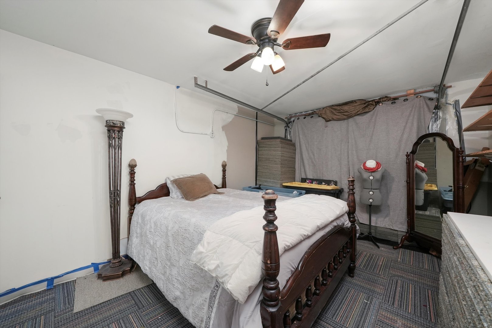 176 Oxford Road Bolingbrook, IL 60440 - Photo 18 of 43 a bedroom with a bed ceiling fan and a wooden floor