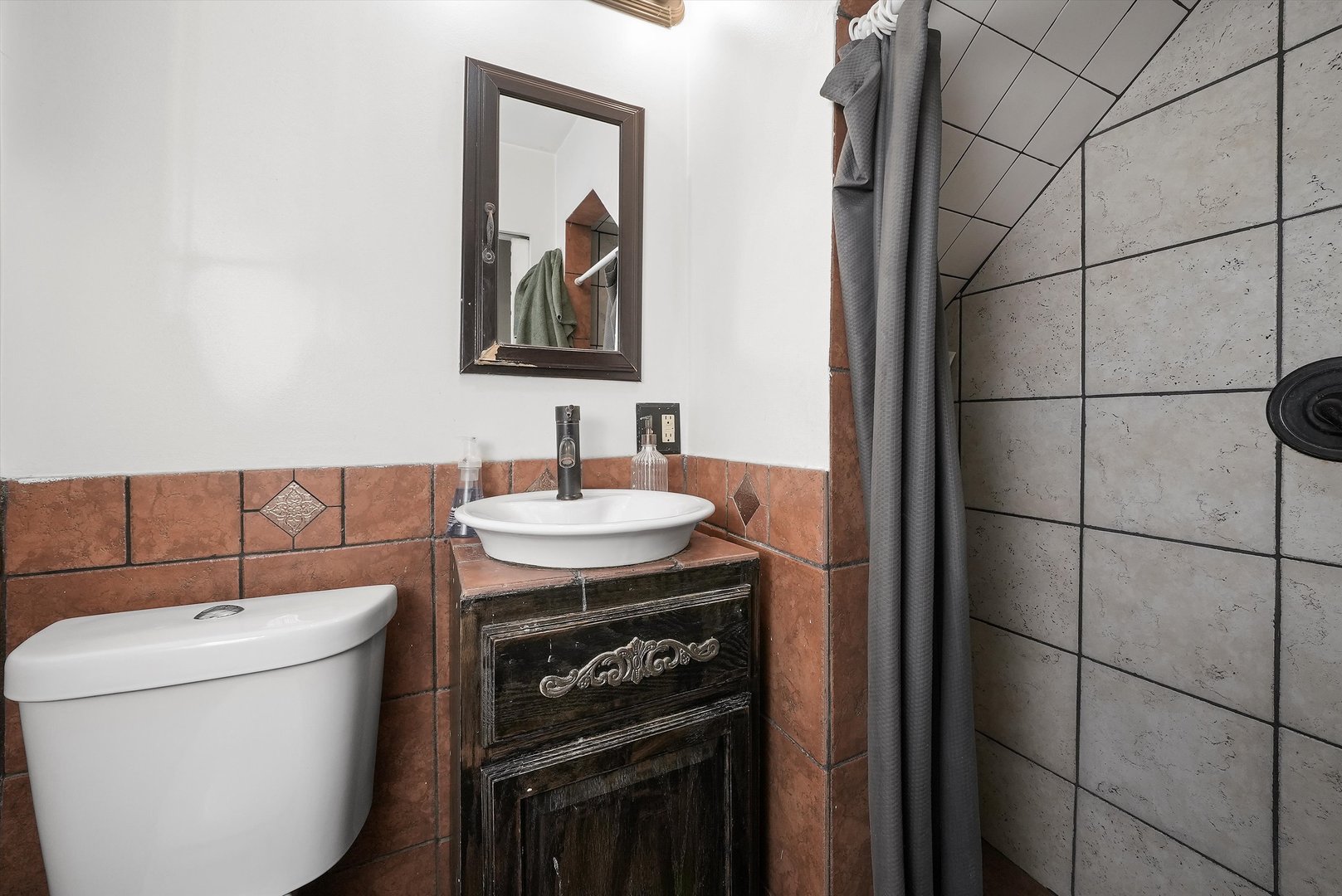 176 Oxford Road Bolingbrook, IL 60440 - Photo 28 of 43 a bathroom with a sink and a mirror