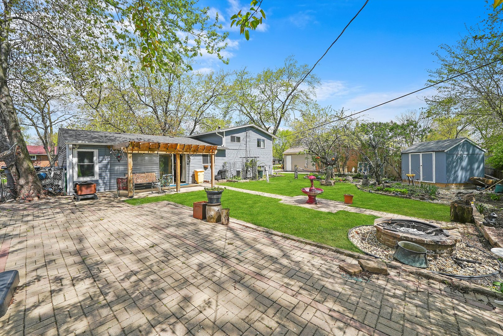 176 Oxford Road Bolingbrook, IL 60440 - Photo 29 of 43 a view of a house with a yard