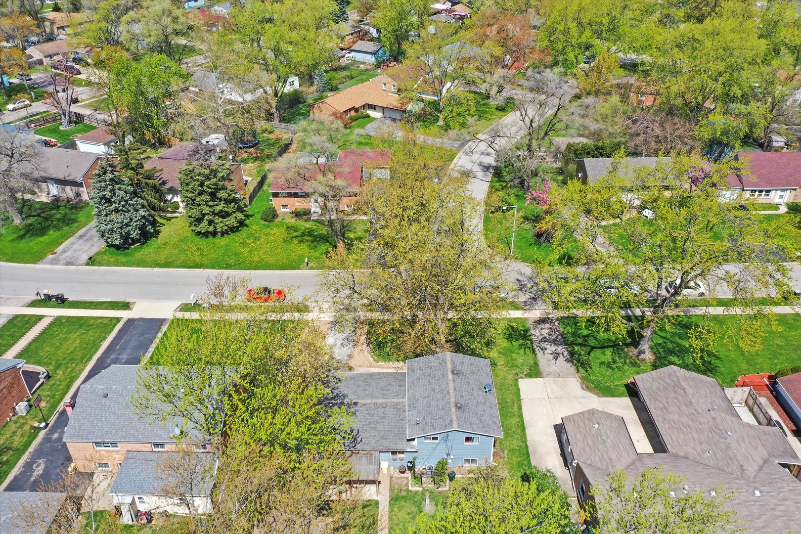 176 Oxford Road Bolingbrook, IL 60440 - Photo 36 of 43 an aerial view of a house with a yard