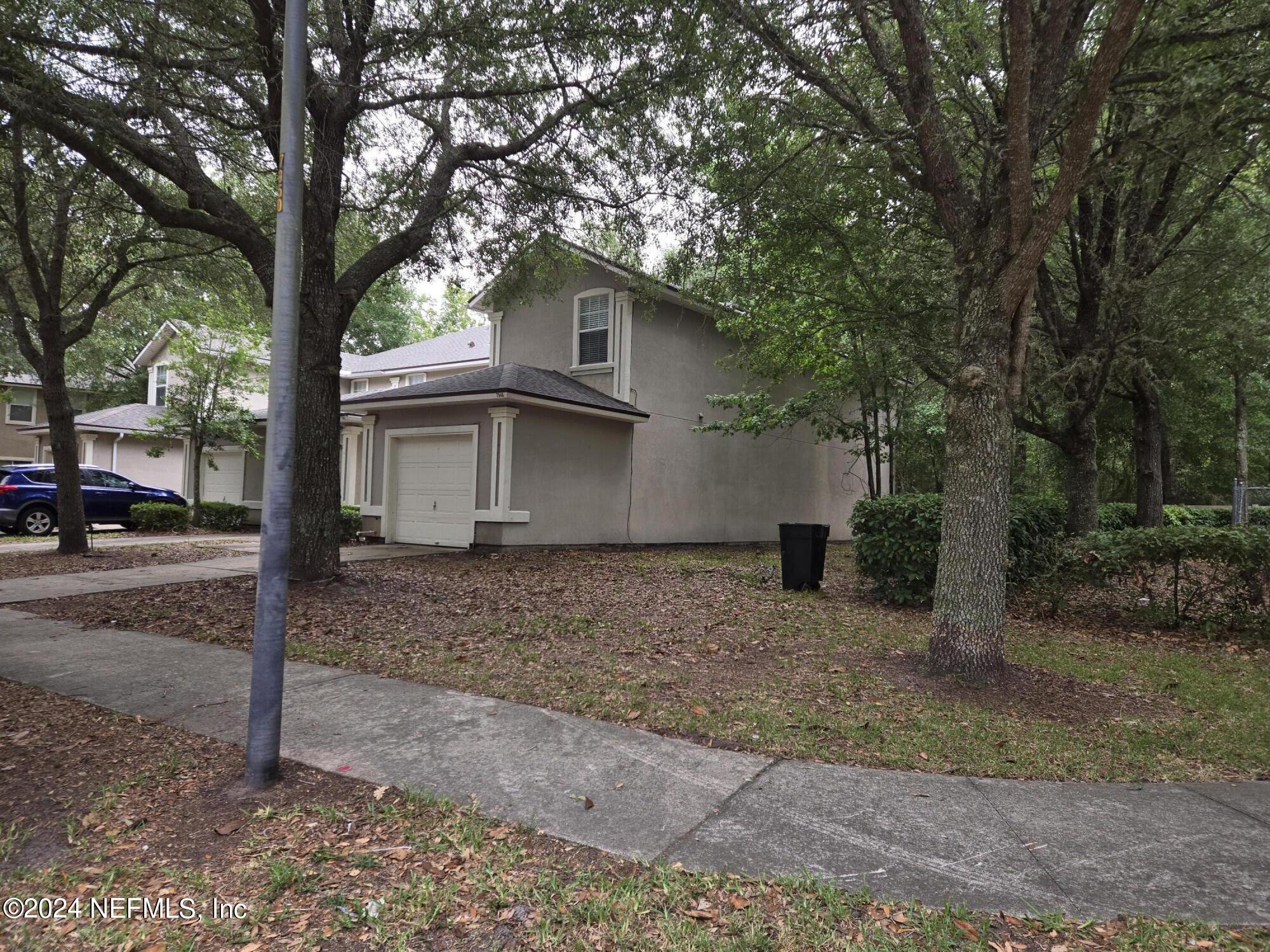 7946 Melvin Road Jacksonville, FL 32210 - Photo 9 of 9 Melvin Side view