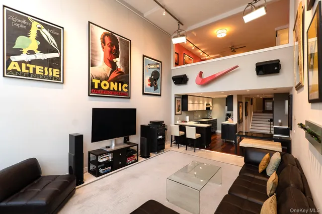 a view of entryway with stairs and wooden floor