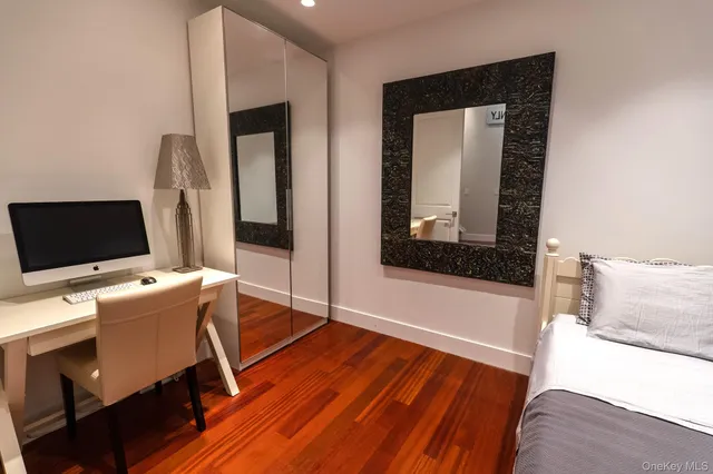 a workspace with furniture and wooden floor