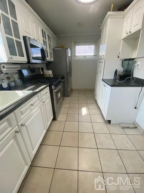 27 Longfield Road New Brunswick, NJ 08901 - Photo 5 of 19 a view of a kitchen with a sink