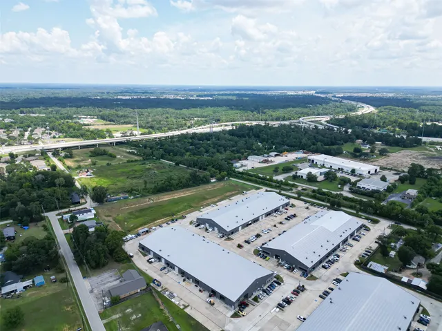 an aerial view of a house with a garden