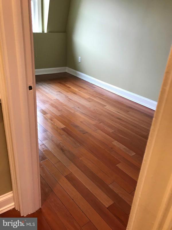 3445 14th Street Northwest, Unit 2 Washington, DC 20010 - Photo 6 of 10 a view of empty room with wooden floor