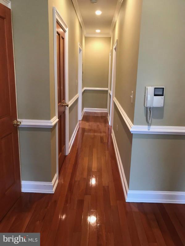 3445 14th Street Northwest, Unit 2 Washington, DC 20010 - Photo 8 of 10 a view of a hallway with wooden floor
