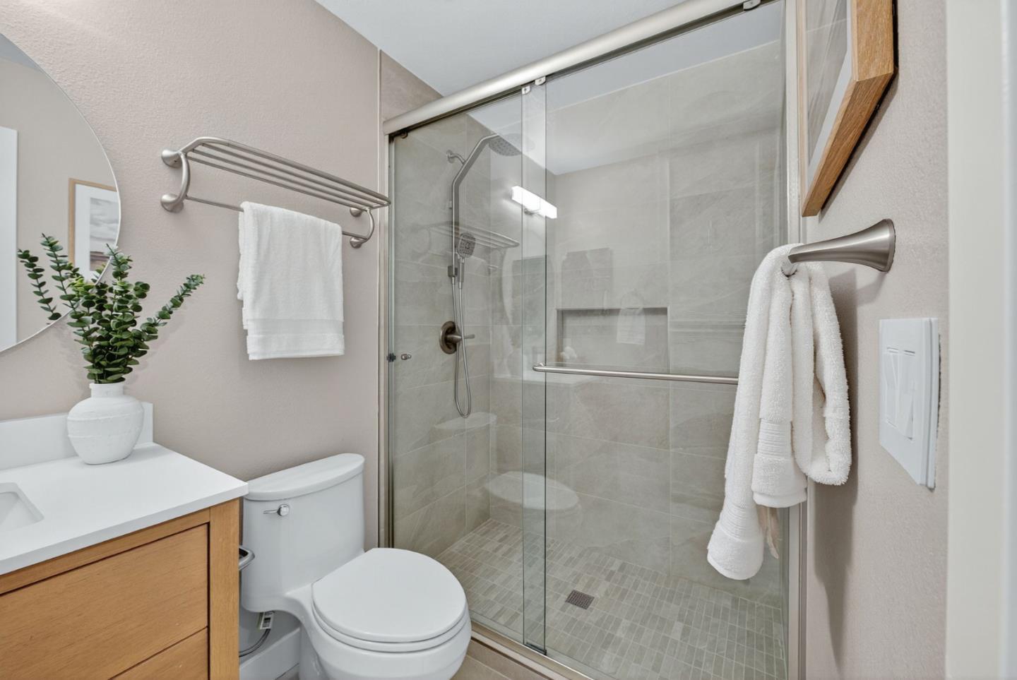 3513 Ivalynn Circle San Jose, CA 95132 - Photo 18 of 46 a bathroom with a shower and toilet