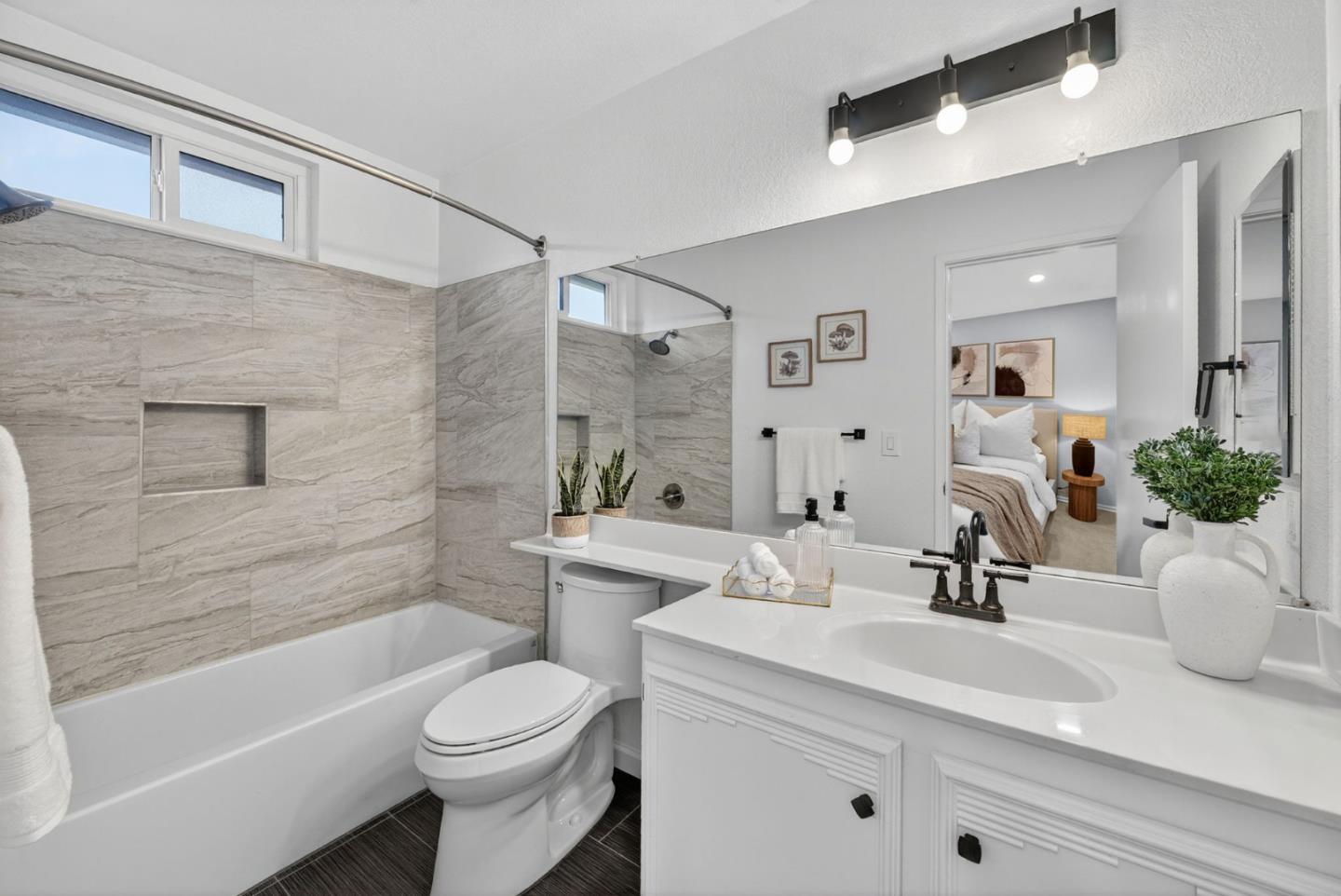 3513 Ivalynn Circle San Jose, CA 95132 - Photo 23 of 46 a bathroom with a sink a toilet and shower