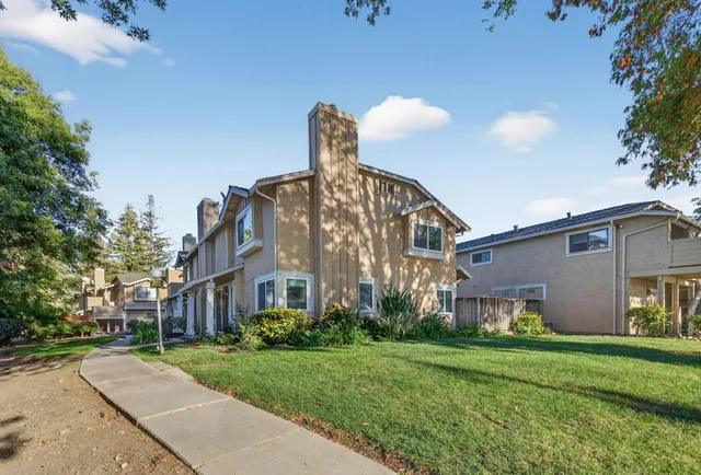 a view of a building with a street